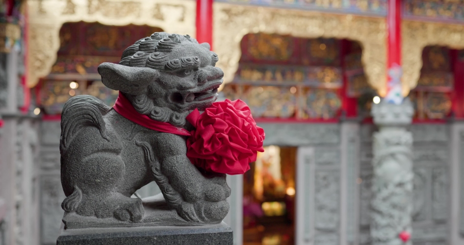 Lion Rock stone statues in chinese temple  