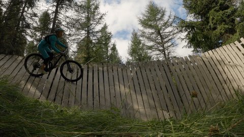 Bike park fun, female rides pushing her mountain bike skills 