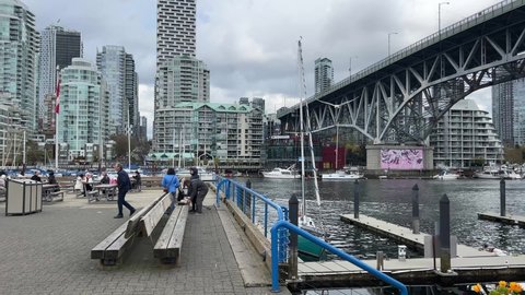 Vancouver, British Columbia, Canada - April 25, 2022: Granville  Island in downtown Vancouver. Popular shopping and tourist district.  