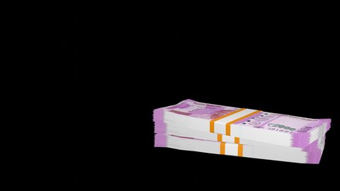 Many wads of money falling down on transparent background. 2000 Indian Rupees banknotes. Stacks of money. Financial and business concept. Alpha channel.