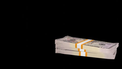 Many wads of money falling down on transparent background. 50 US dollar banknotes. Stacks of money. Financial and business concept. Alpha channel.