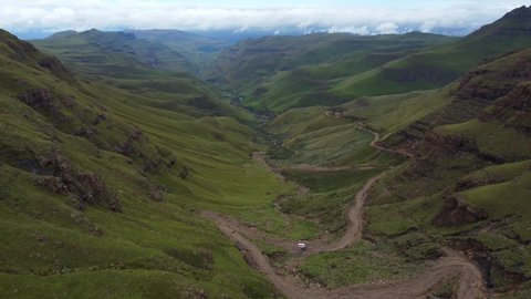 Drone shot of Drakensberg in South Africa - drone is flying over famous Sani Pass. Snippet could ideally be used for travel related videos or hikingies.