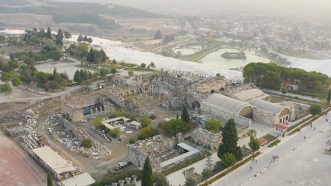 Pamukkale, Turkey (Cotton Castle), ancient Hierapolis (Holy City), Aerial view of Travertines with turquoise water and of Ancient ruins of Hierapolis Pamukkale - Denizli - Turkey