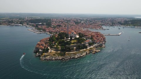 Aerial view of St. Euphemia church in Rovinj old town, Istria, Croatia. Aerial drone footage of the famous Rovinj medieval old town with its Venetian architecture in the Istria region of Croatia.