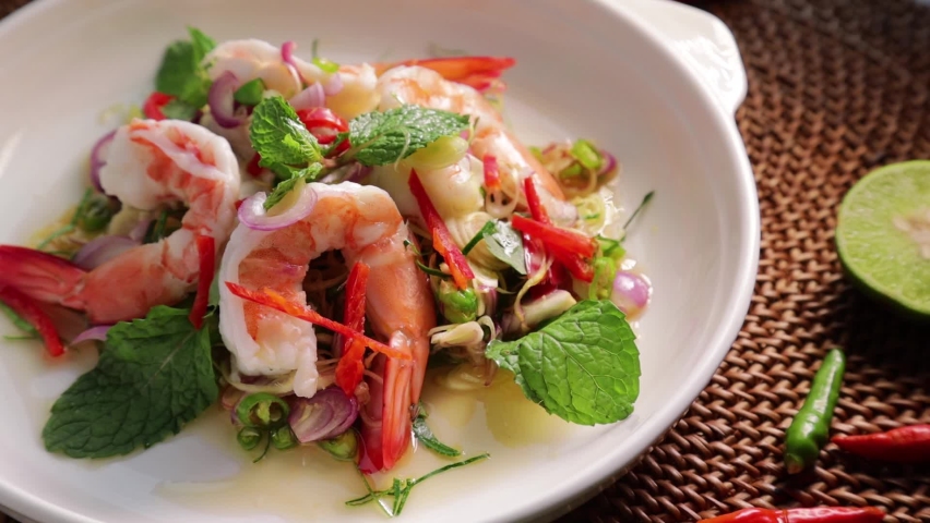 Spicy Shrimp Salad in White Plate on Set,The Famouse Menu of Thai Food in Thailand | Shutterstock HD Video #1089940681