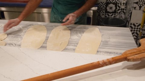 Turkish chef makes preparation for Pide