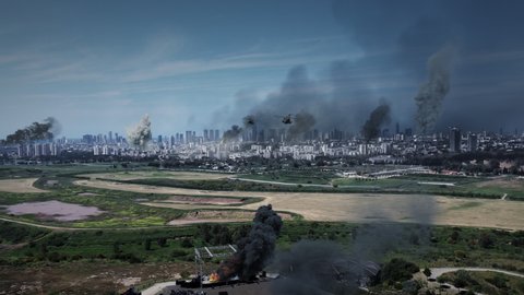 Large city under massive attack with destroyed buildings, aerial
Drone view over Tel aviv city bombarded with smoke rising and helicopters, israel,2022
