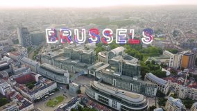 Inscription on video. Brussels, Belgium. The complex of buildings of the European Parliament. State institution. Glitch effect text, Aerial View, Point of interest - Powered by Shutterstock - Get 15% off with code: PIKWIZARD15