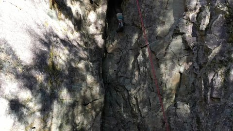 Whitefish , Montana , United States - 10 13 2021: Woman Climbing On Steep Rock Face