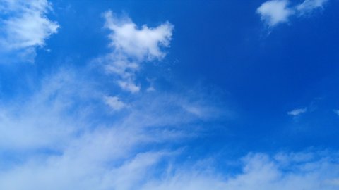 Nature weather blue sky and White clouds, beautiful cloudscape, Puffy white clouds timelapse, White clouds background, Clouds moving fast and transforming in deep blue sky.