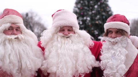 Santa Claus wishes children a Happy New Year and Merry Christmas, magic time for kids