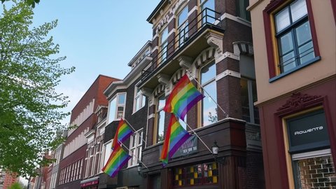 GRONINGEN, NETHERLANDS - 04. MAY 2022: Pride Flag LGBTQ+ waving on a bar in Groningen