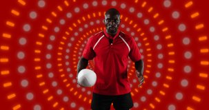 Animation of african american male american football player with ball over shapes. global sport and digital interface concept digitally generated video.