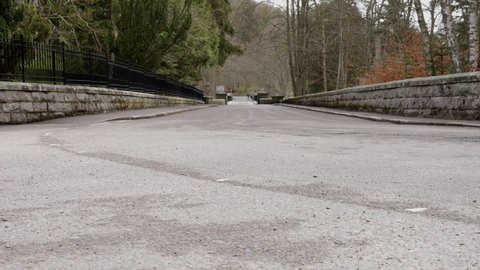 1st May 2022, Ballater Scotland. The bridge over the river Dee that leads to the queens Balmoral estate.