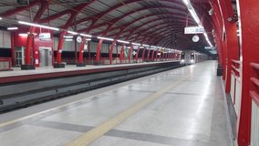 Metro arriving at platform in India.