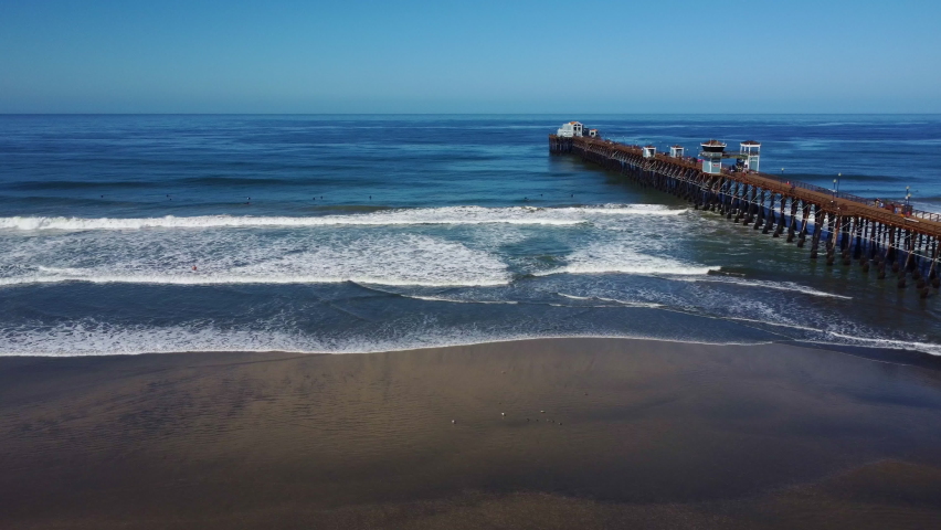 Oceanside pier aerial view panning shot