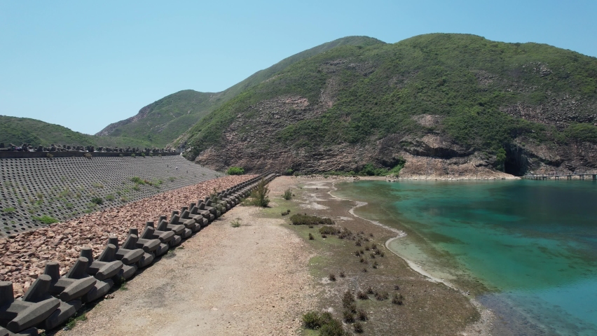 High Island Reservoir East Dam in Sai Kung Hong Kong Global Geopark ,is a rare volcanic hexagonal rock columns, beautiful scenery, hiking trails, beaches and islands, geological formations, sea bay