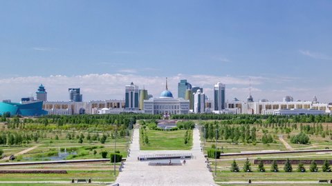 Panorama of the Astana city timelapse and the president's residence Akorda with park. View from the Palace of Peace and Reconciliation. Nur-Sultan city, Kazakhstan.