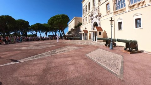 Monaco, October 6, 2021: PAN SHOT - The changing of the guard ceremony takes place on the Palace Square, a solemn military ritual performed with perfect coordination.