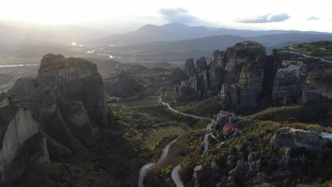 4k cinematic aerial video of medieval monasteries on top of impressive rock formations at Meteora, Greece