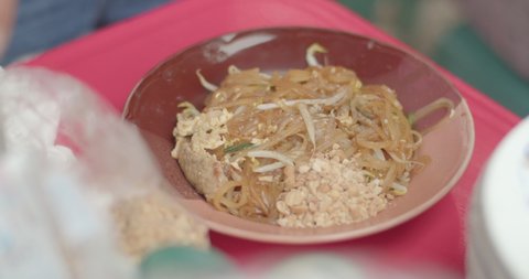 How to make Pad Thai, sprinkle with dried shrimp to eat with noodles to add mellowness.