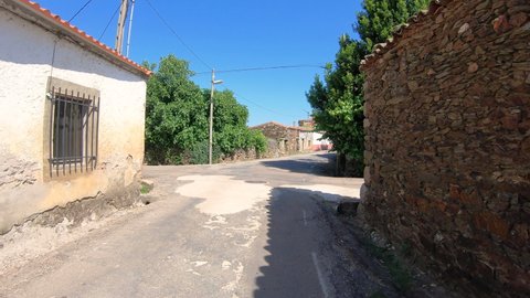 a paved road passing through La Alameda de Gardón, province of Salamanca, Castile and Leon, Spain - dolly