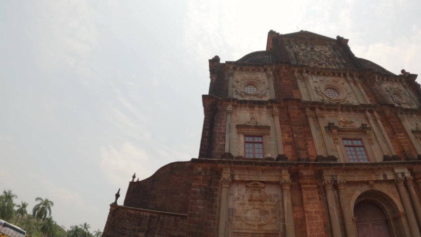Wide angle shot of Basilica of Bom Jesus monument in Goa, India. Ancient church built by Portuguese at Panaji in North Goa. UNESCO world heritage site of Goa, Ancient architecture of Portuguese.  | Shutterstock HD Video #1090016119
