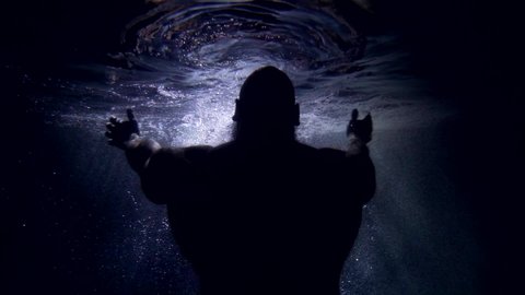 dark silhouette of Poseidon god underwater, muscular back and arms of strong man