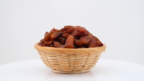 Raisins isolated on a white background.