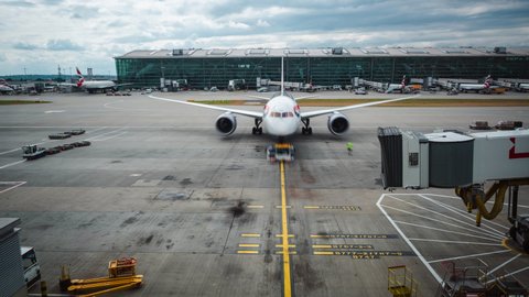 London, England - May 06, 2022: Time lapse view of British Airways passenger aircraft departing from Heathrow Airport in London, England. 