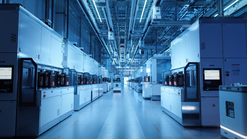 Wide Shot Inside Advanced Semiconductor Production Factory Cleanroom. Automated Robots are Transporting Wafers between Machines. | Shutterstock HD Video #1090032161