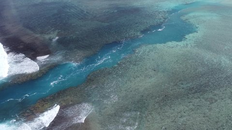 Strong ocean current passing through the reef passage at Rarotonga, Cook Islands
