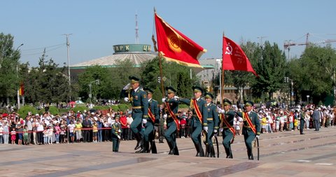 Bishkek, Kyrgyzstan - May 9, 2022: Guard of honor marching during Victory Day on a square