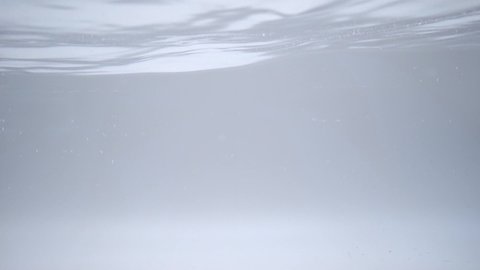 Clear water background with little wave surface.