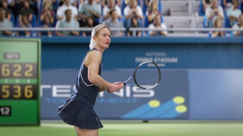 Female Tennis Player Hitting Ball with a Racquet During Championship Match. Professional Woman Athlete Striking Ball. World Sports Tournament with Audience Cheering. Cinematic Slow Motion Playback