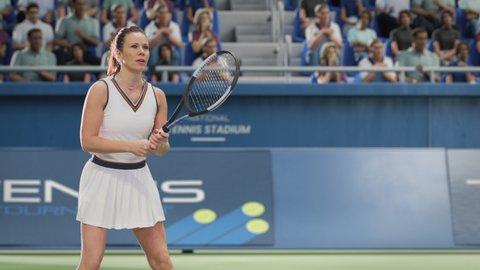 Female Tennis Player Hitting Ball with a Racquet During Championship Match. Professional Woman Athlete Striking Ball. World Sports Tournament. Cinematic Slow Motion Medium Shot Playback