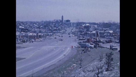 CIRCA 1974 - Helicopters fly over the wreckage left by a tornado in Xenia, Ohio.