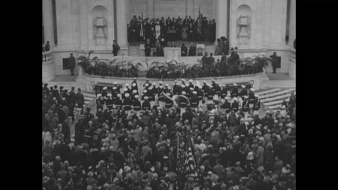 CIRCA 1920s - President Coolidge and the First Lady leave flowers on the Tomb of the Unknown Soldier at Arlington National Cemetery.
