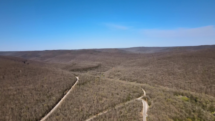 ARKANSAS - CIRCA 2022 - Aerial shot over the Winona Scenic Drive region of Lake Ouachita National Forest neark Hot Springs, Arkansas.