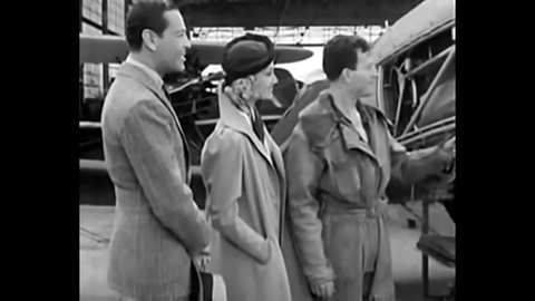 CIRCA 1937 - In this adventure movie, an airplane mechanic is sarcastic to the woman who employs him.