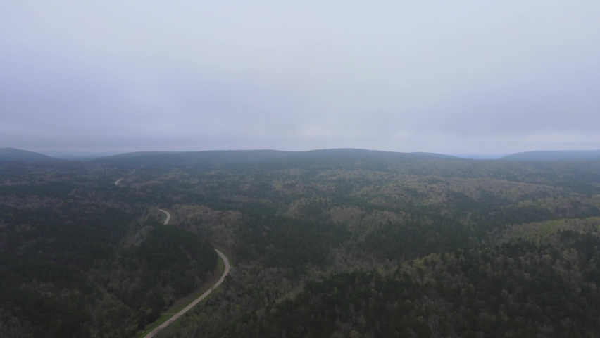 ARKANSAS - CIRCA 2022 - Aerial shot over the Winona Scenic Drive region of Lake Ouachita National Forest neark Hot Springs, Arkansas.