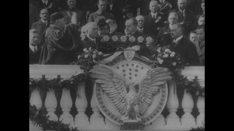 CIRCA 1923 - On inauguration day, President Coolidge is sworn into office by Chief Justice William Taft.