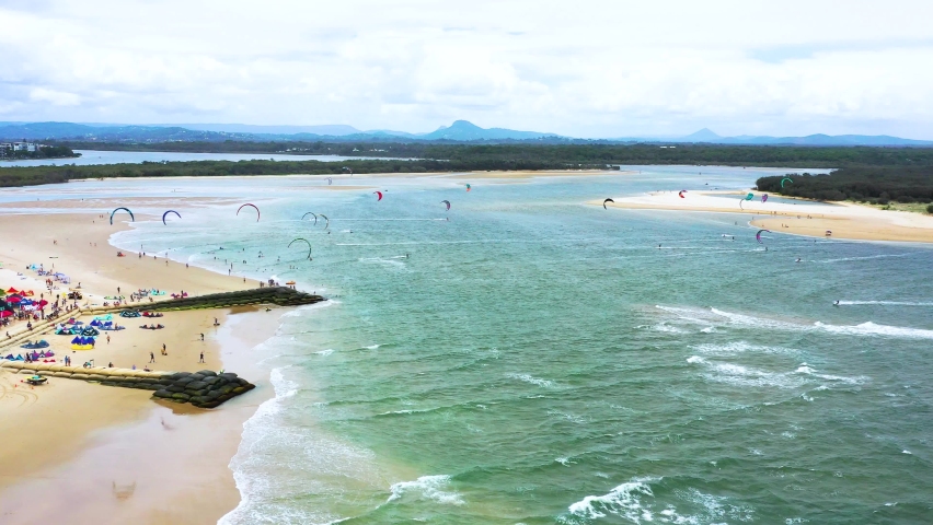 Aerial view of a kitesurfing competition, Queensland, Australia. Royalty-Free Stock Footage #1090049573