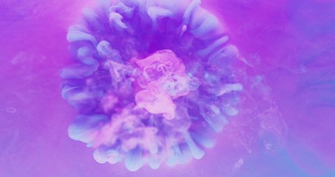 Color explosion. Paint water drop. Magic energy. Logo reveal. Iridescent pink blue vapor drop spreading motion abstract background shot on RED Cinema camera.