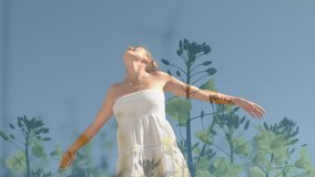 Animation of meadow over caucasian woman with arms outstretched. never give up day and celebration concept digitally generated video.