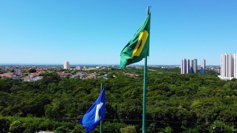Flag of Brazil and Mato Grosso fluttering in the sky of Cuiabá capital of Mato Grosso
