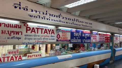 BANGKOK, THAILAND - Circa February, 2022 : Tickets counters sign to Pattaya, Chon buri, Rayong, at Bangkok bus terminal eastern Ekkamai. POV shot day time editorial. Text above means Bon Voyage