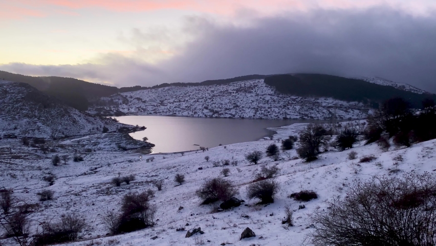 Drone shooting of the Cartolari lakes on the Nebrodi mountains in winter. View of Mount Etna in winter, Sicily, Italy. Snow capped mountains in Sicily. Lake Trearie. Lake of Liperni.