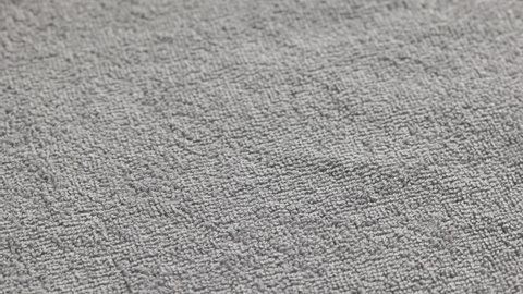 closeup loopable full-frame background of gray soft cotton towel