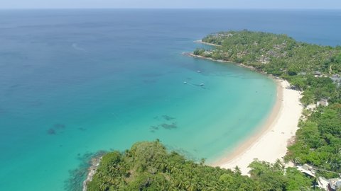 Aerial view of Phuket sea and sand beach in summer season Amazing sea beach with ocean wave foams. Beautiful nature view sea surface. Concept holiday summer background Travel destination